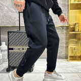 Close-up detail shot of Louis Vuitton luxury clothing with everyday silhouette