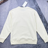 Side profile of Gucci luxury clothing with signature branding