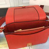 Top view of classic polished women's handbag – women's luxury accessory