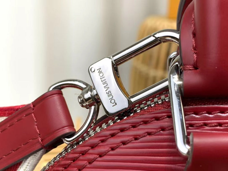 Handle and strap detail of polished classic women's handbag – women's statement bag