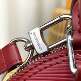 Handle and strap detail of polished classic women's handbag – women's statement bag