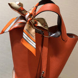 Side view of modern structured handbag