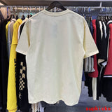 Close-up detail shot of Rhude luxury clothing with relaxed-fit cut