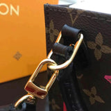 Handle and strap detail of polished chic women's handbag – women's designer-style accessory