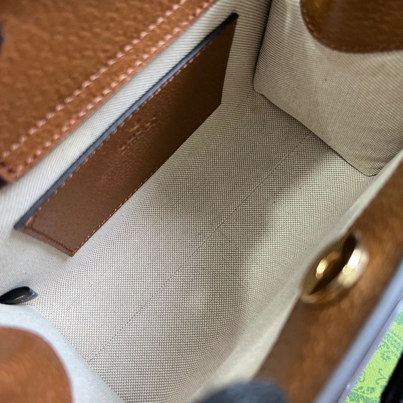 Side profile of refined modern women's handbag – women's luxury handbag