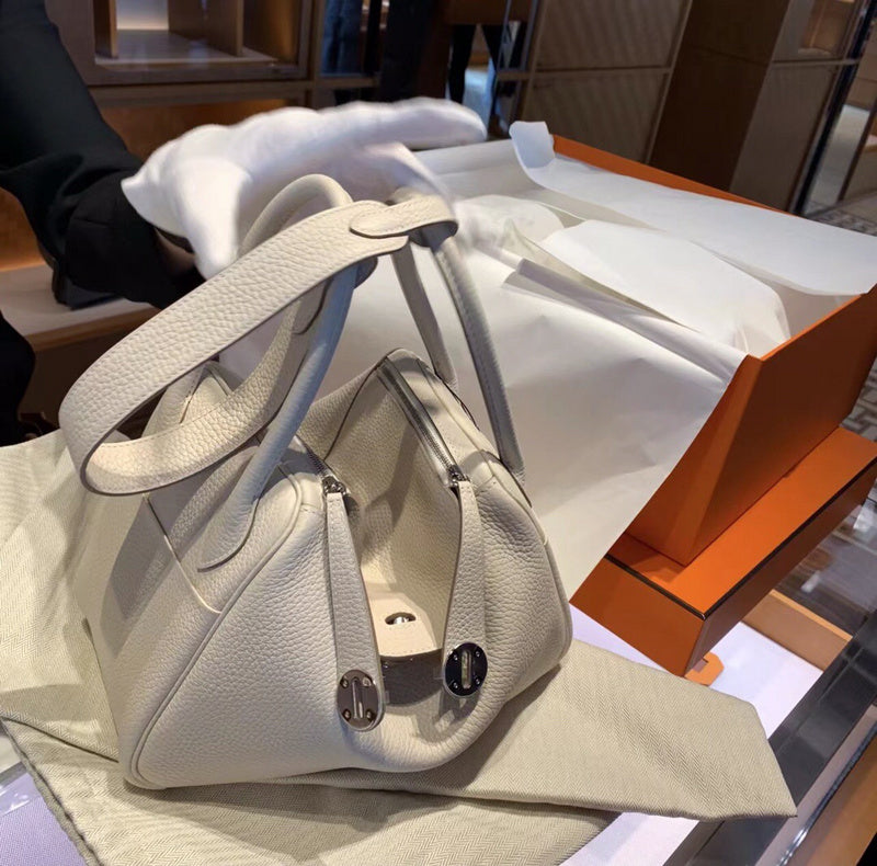 Side view of sleek structured handbag