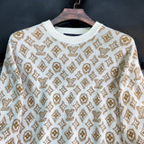 Full styled look of Louis Vuitton luxury clothing with monogram-inspired silhouette