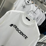 Close-up detail shot of Louis Vuitton cotton t-shirt with monogram-inspired silhouette