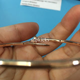 Front view of Cartier unisex jewelry piece
