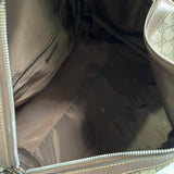 Side profile of classic signature women's handbag – women's statement bag