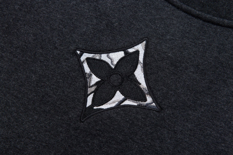 Front view of Louis Vuitton luxury clothing with signature branding