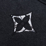 Front view of Louis Vuitton luxury clothing with signature branding
