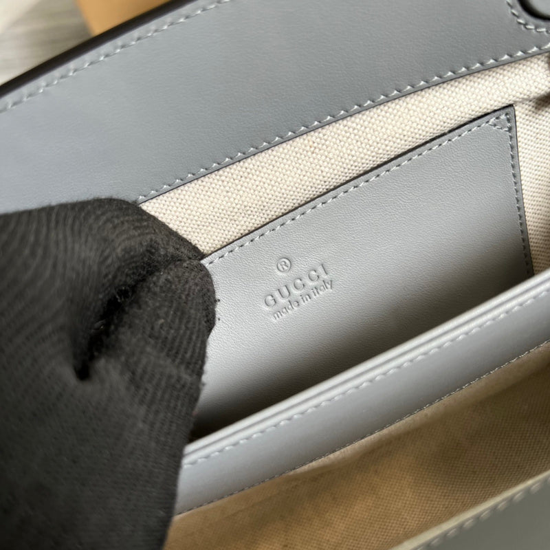 Side profile of modern refined women's handbag – women's luxury handbag