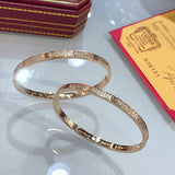 Close-up detail view of Cartier unisex jewelry piece