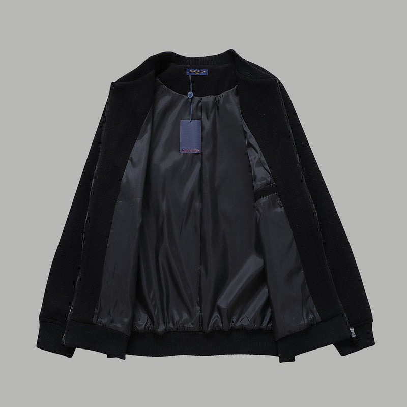Close-up detail shot of Louis Vuitton luxury clothing with signature branding