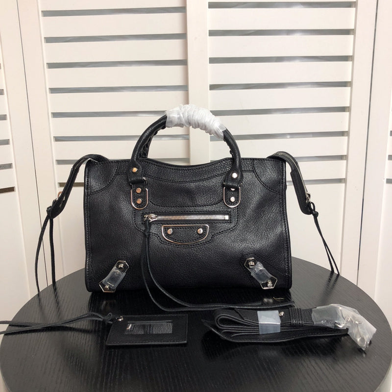 Side profile of elevated modern women's handbag – women's statement bag