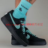 Side profile of Nike all-black sneakers everyday casual design