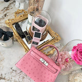  Elegant structured bag carried on shoulder