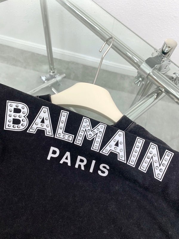 Texture and finish detail of Balmain luxury piece style No.084