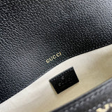 Side profile of elevated classic women's handbag – women's luxury accessory