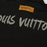 Side profile of Louis Vuitton luxury clothing with logo-detail design