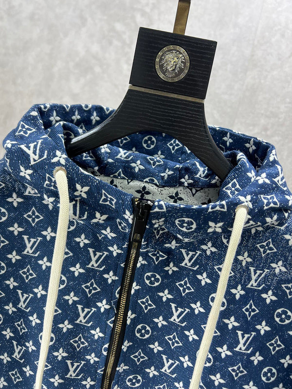 Close-up detail shot of Louis Vuitton luxury clothing with label-forward styling