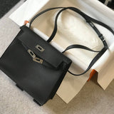 Side view of sculpted structured handbag