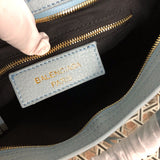 Close-up detail of chic everyday-luxe women's handbag – women's statement bag