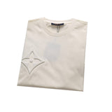 Flat lay presentation of Louis Vuitton cotton t-shirt with signature branding