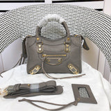 Front view of polished structured women's handbag – women's designer-style accessory