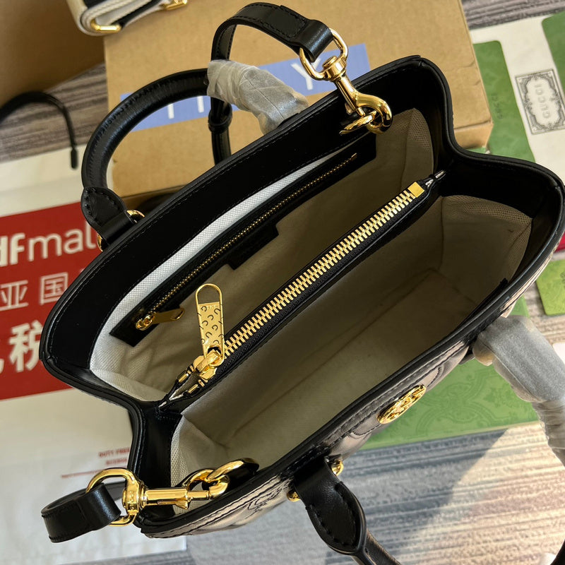 Top view of signature polished women's handbag – women's luxury handbag
