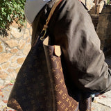  Understated crossbody bag front view 25