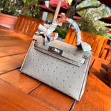 Side view of polished structured handbag