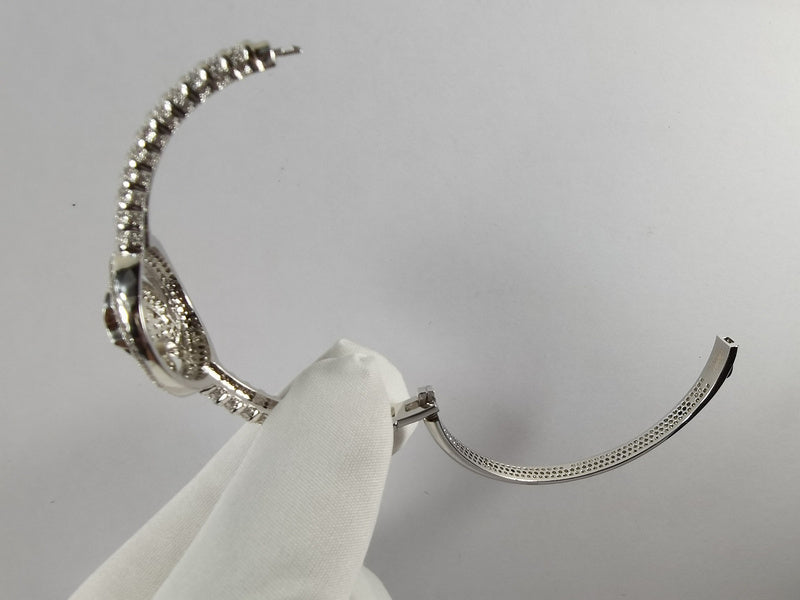 Side view of Cartier unisex jewelry piece