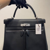 Side view of minimalist structured handbag