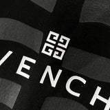 Flat lay presentation of Givenchy luxury clothing with everyday silhouette