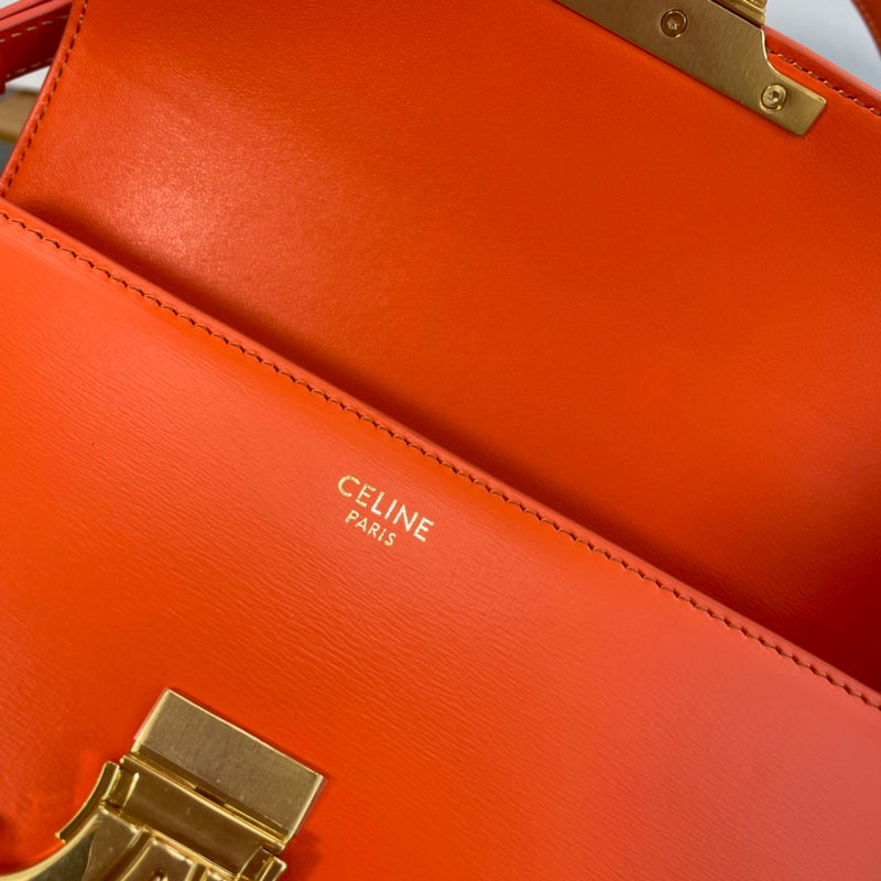 Front view of elevated polished women's handbag – women's statement bag