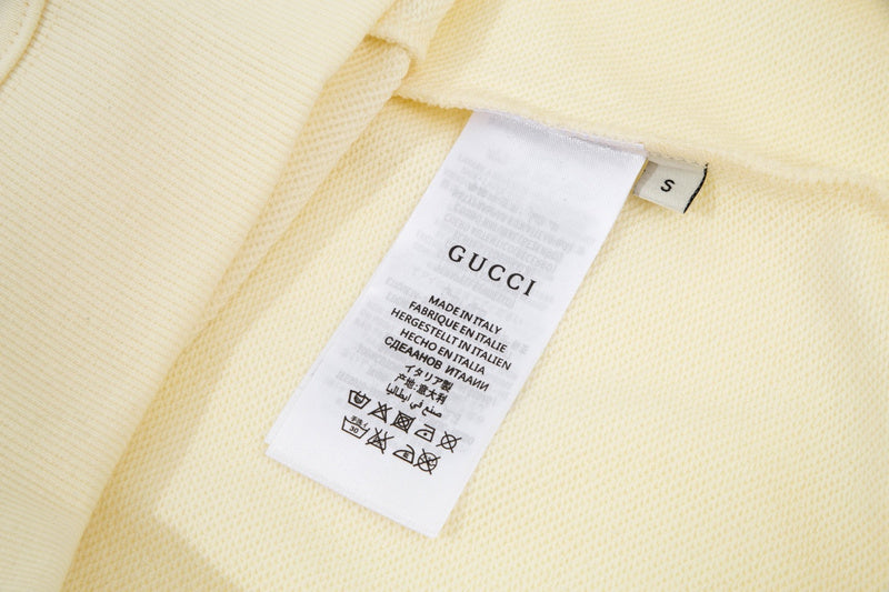 Close-up detail shot of Gucci luxury clothing with everyday silhouette