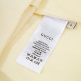 Close-up detail shot of Gucci luxury clothing with everyday silhouette