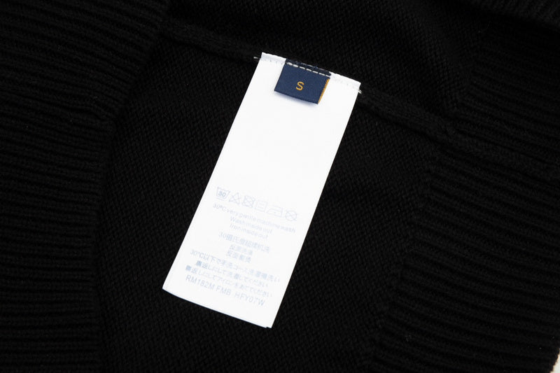 Close-up detail shot of Louis Vuitton luxury clothing with relaxed-fit cut