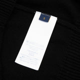 Close-up detail shot of Louis Vuitton luxury clothing with relaxed-fit cut