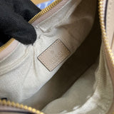 Side profile of structured statement women's handbag – women's everyday handbag