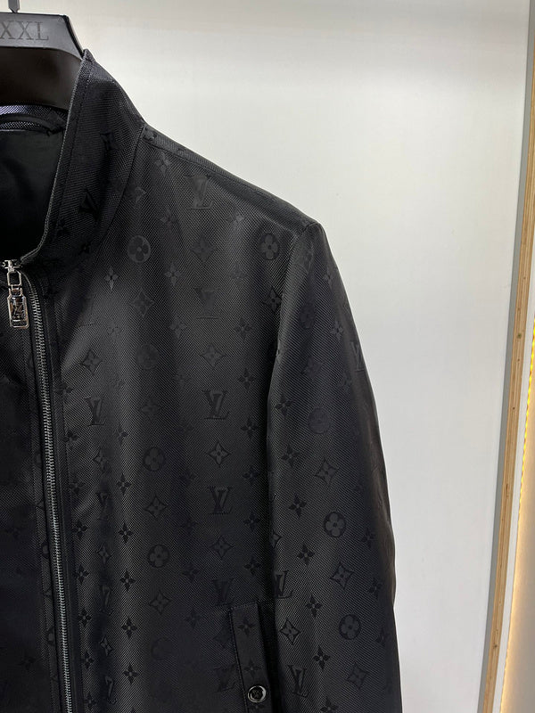 Full styled look of Louis Vuitton luxury clothing with label-forward styling