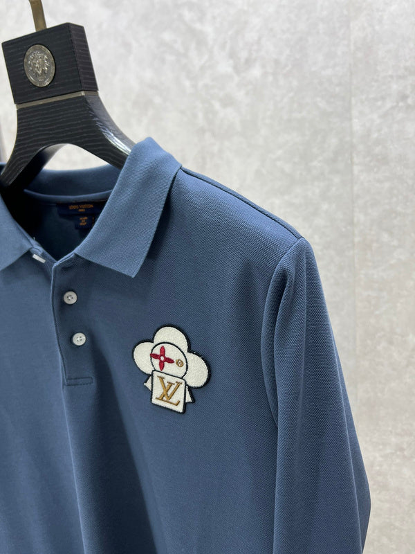 Front view of Louis Vuitton luxury clothing with logo-detail design