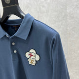 Front view of Louis Vuitton luxury clothing with logo-detail design