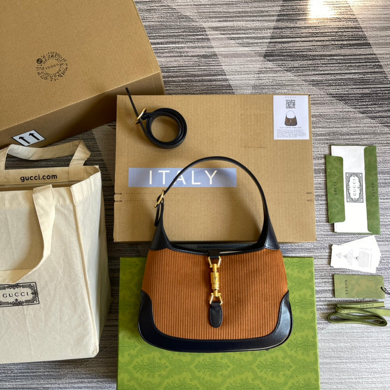 Front view of polished structured women's handbag – women's designer-style accessory