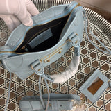 Interior view of structured everyday-luxe women's handbag – women's designer-style accessory