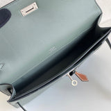 Side view of clean-lined structured handbag