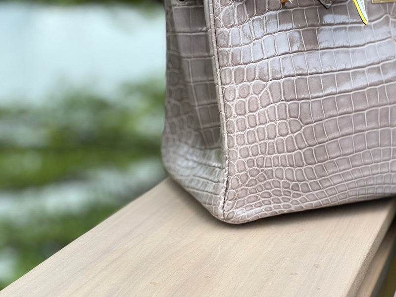 Side view of structured structured handbag