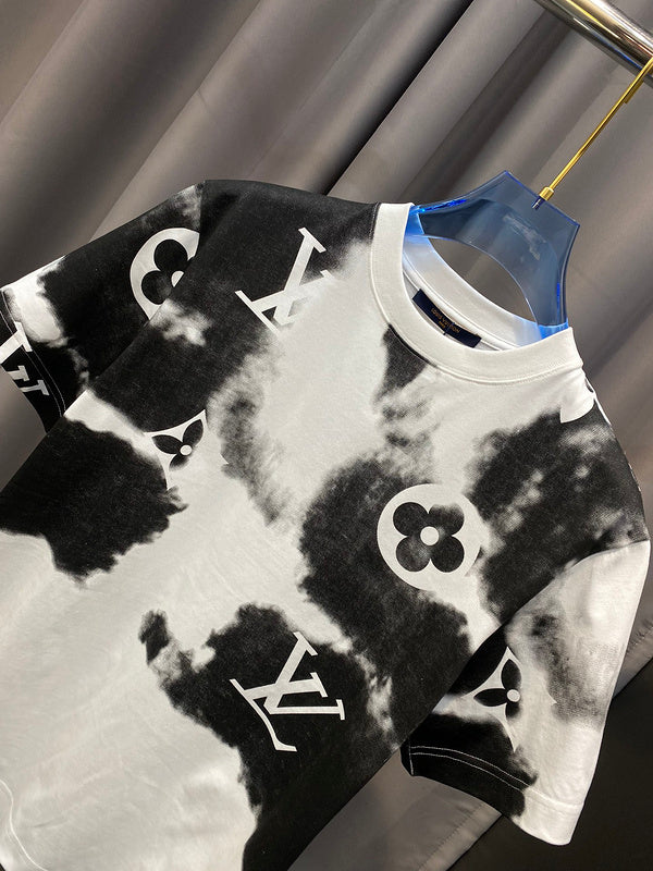 Close-up detail shot of Louis Vuitton cotton t-shirt with signature branding